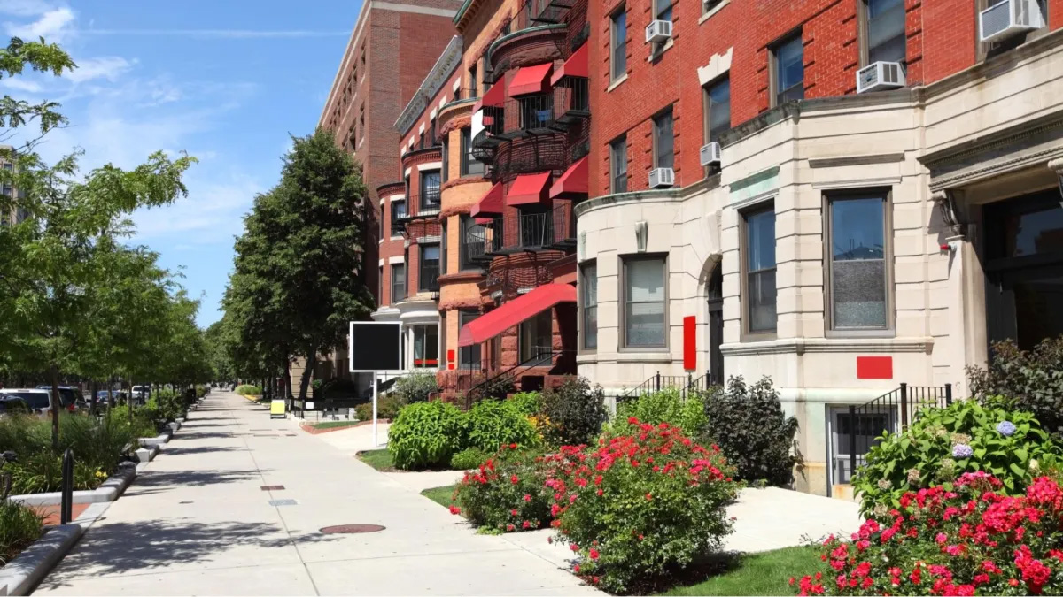 Colorful buildings with lush landscaping.