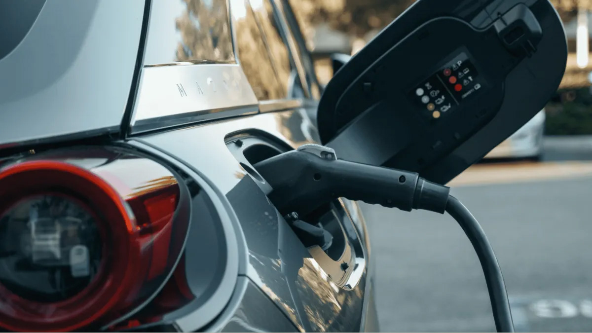 Finding-the-Right-EV-Charger-Electrician Electric vehicle charging port in use