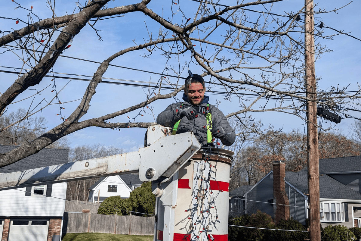 Holiday Lighting Safety MA Holiday lighting safety on a Massachusetts home showing properly installed outdoor Christmas lights to prevent electrical fires